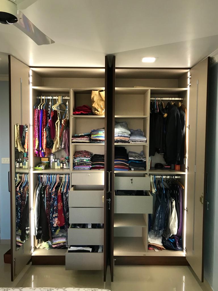 Cane Finish Hinged Wardrobe by KK modular Kitchen and Interiors in Lower Parel, Mumbai india