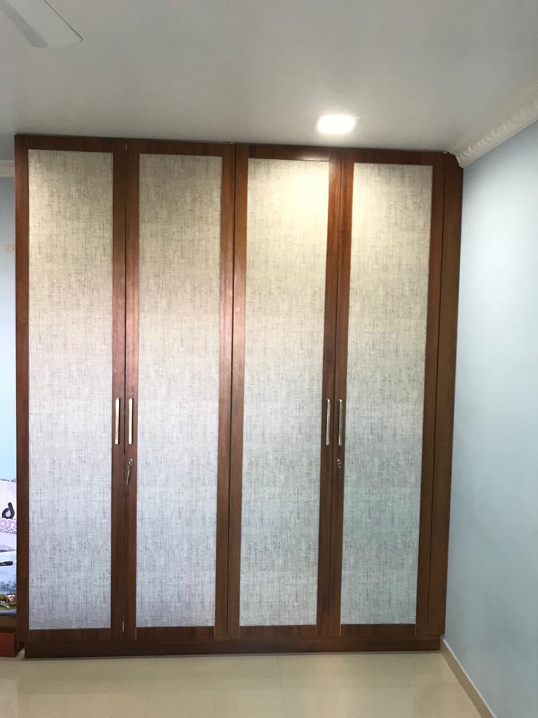 Cane Finish Hinged Wardrobe by KK modular Kitchen and Interiors in Mumbai